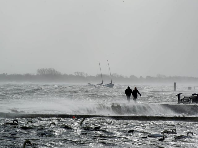 Storm Eunice was the first major storm to hit Portsmouth since Storm Barra in December 2021.

Pictured: A couple walking along Emsworth Harbour Walk

Picture: Habibur Rahman