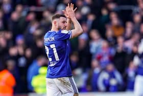 Conor Chaplin applauds the travelling Fratton faithful at Portman Road last season.