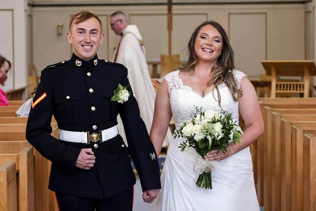 Walking down the aisle: Lance Corporal Jake Kennedy and Petty Officer Naval Nurse Jo Parke at their marriage at St Ann's Church.