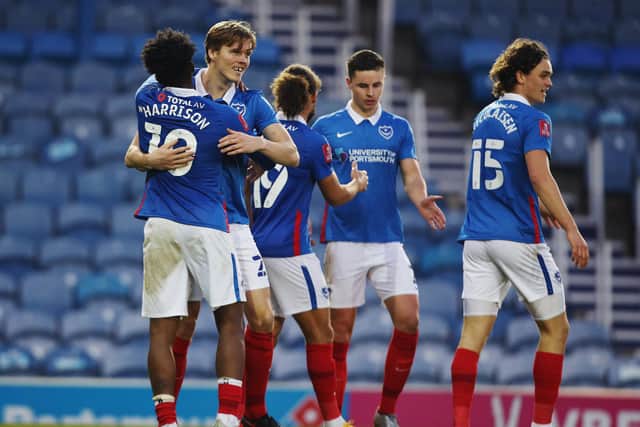 Sean Raggett celebrates his second-half effort