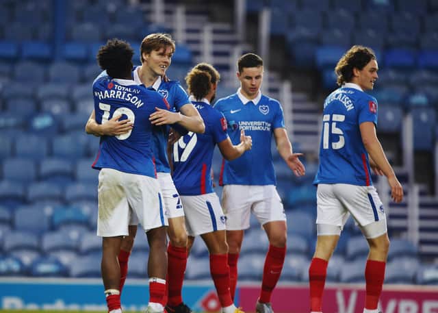 Sean Raggett celebrates his second-half effort