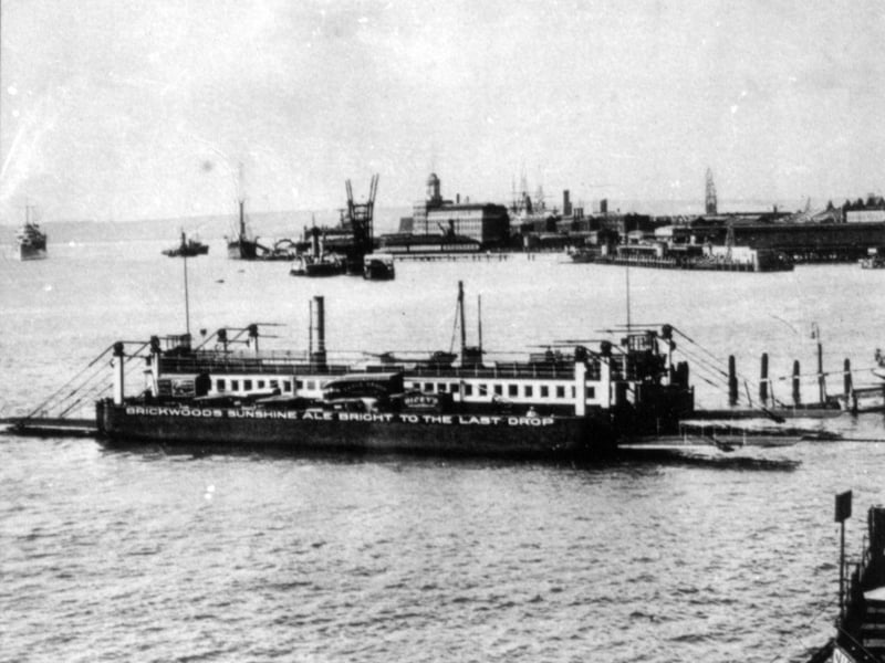 A floating bridge awaits more trade at Point, Old Portsmouth.