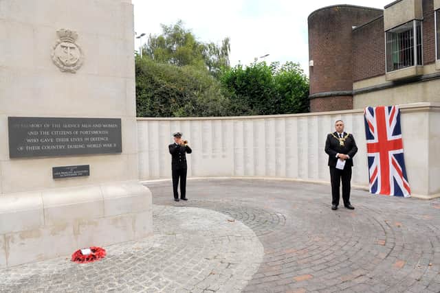 A memorial bearing the names of all city people who gave their lives in the conflict, military and civilian, has long been the vision of Jean Louth. The Lord Mayor of Portsmouth, Councillor David Fuller with (left) Bugler Kevin Jones. Picture: Malcolm Wells