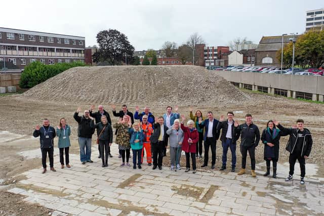 To mark the levelling of Leamington House tower block in Somerstown, some of the residents who joined the community panel during the deconstruction work joined councillors and Portsmouth City Council officers at the site Picture: Portsmouth City Council