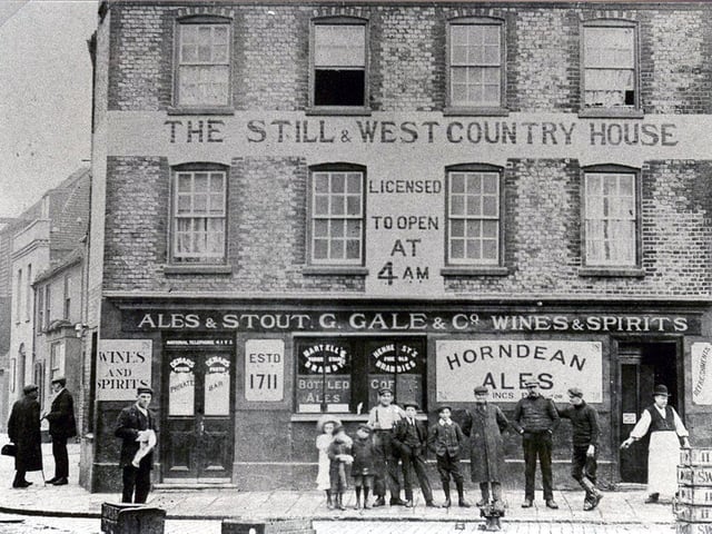 The Still & West Country House in Bath Square, Old Portsmouth. Dating from about 1733, this popular pub at the mouth of the harbour was originally known at The Still Tavern. In the early 1900s a busy daily fish market was held immediately in front of the building - hence the 4am opening time.