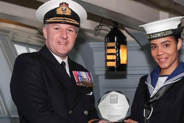 AB Lisa Williams picks up a prize at the navy's apprenticeship awards. Photo: Royal Navy