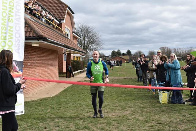 Nathan Tracey has completed his 24 hour non stop running challenge for Portsmouth Down Syndrome Association. 
Picture credit: Melanie Tracey