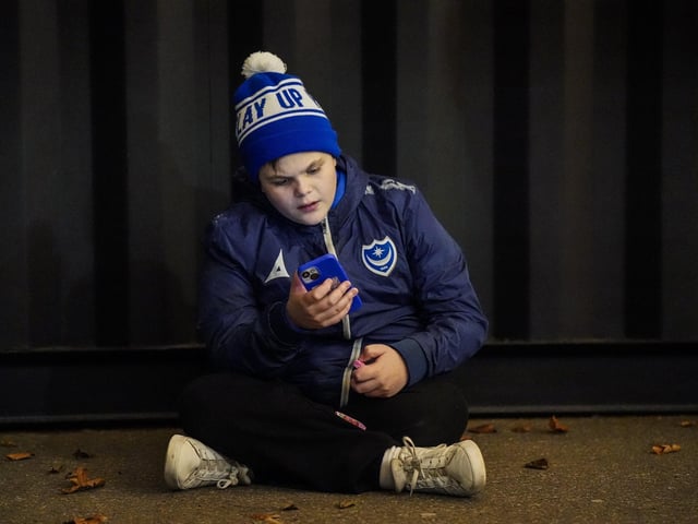 This young fan is clearly on The News website checking out all the pre-match coverage ahead of kick-off!
