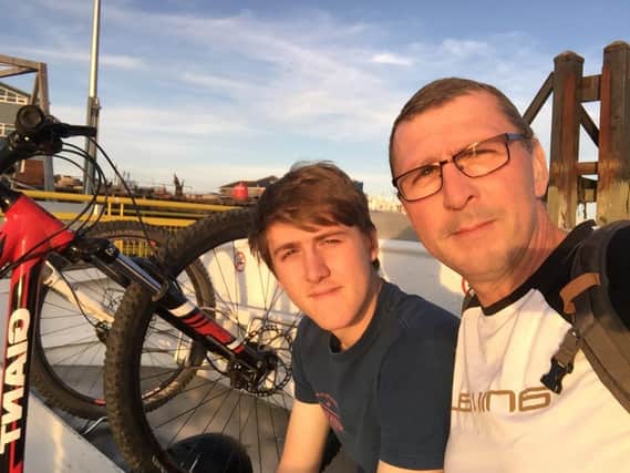 Tim Hitchings with his son Callum