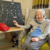 June Taylor, 88, was "thrilled" as staff at Care UK's Pear Tree Court in Horndean, Hampshire, were determined to let her relive what she called "fond memories" of her time as a telephonist, as they made Ms Taylor a replica of the switchboard she worked on during her career. Issue date: Wednesday March 29, 2023. Picture: Care UK/PA Wire