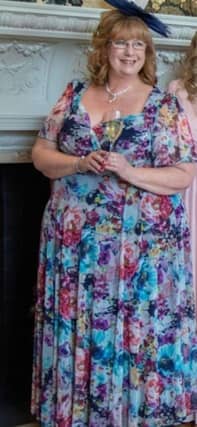 Debbie in her mother of the bride dress before she decided to lose weight