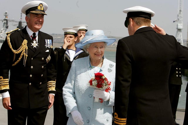 Britain's Queen Elizabeth II is greeted as she boards HMS  Endurance with Admiral Sir Alan West (left) in Portsmouth on her way to review the fleet, Tuesday June 28, 2005.  A total of 167 ships from the Royal Navy and 35 nations are taking part in the International Fleet Review at Spithead, off Portsmouth, as part of the Trafalgar 200 celebrations this week. See PA Story SEA Trafalgar. PRESS ASSOCIATION Photo. Photo credit should read: Kirsty Wigglesworth/PA/WPA Rota 