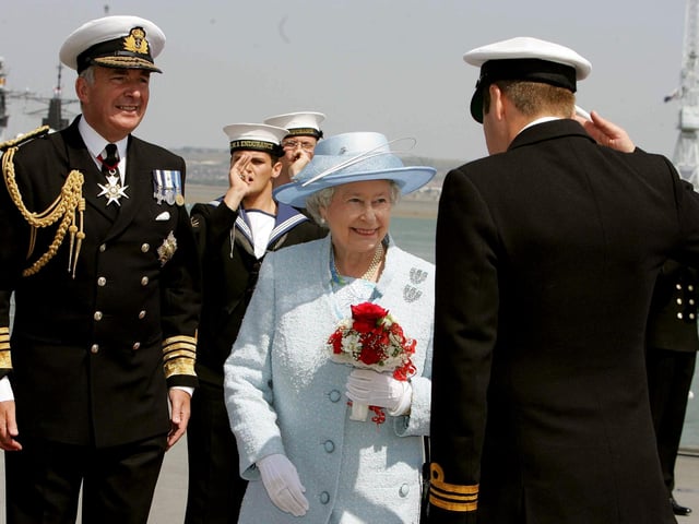 Britain's Queen Elizabeth II is greeted as she boards HMS Endurance with Admiral Sir Alan West (left) in Portsmouth on her way to review the fleet, Tuesday June 28, 2005. A total of 167 ships from the Royal Navy and 35 nations are taking part in the International Fleet Review at Spithead, off Portsmouth, as part of the Trafalgar 200 celebrations this week. See PA Story SEA Trafalgar. PRESS ASSOCIATION Photo. Photo credit should read: Kirsty Wigglesworth/PA/WPA Rota