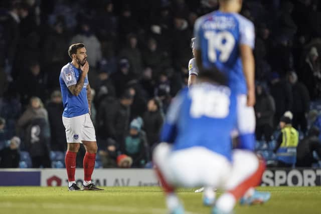 Pompey players after the dreadful MK Dons defeat.