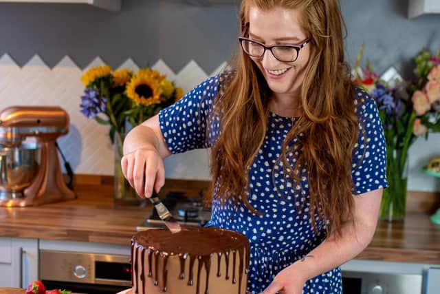 Jane Dunn decorating one of her delicious cakes. Picture: Jane's Patisserie