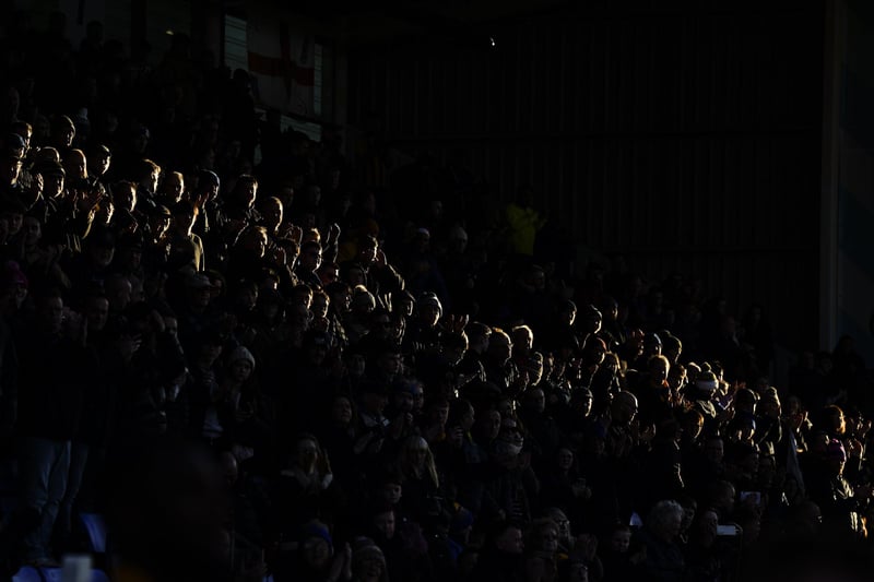 Shard of light shines on the Pompey fans during today's game at Shrewsbury