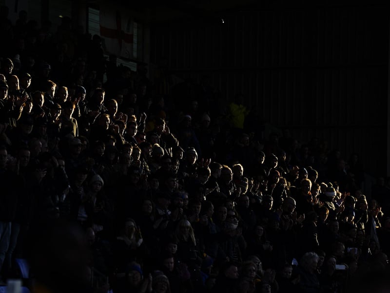 Shard of light shines on the Pompey fans during today's game at Shrewsbury