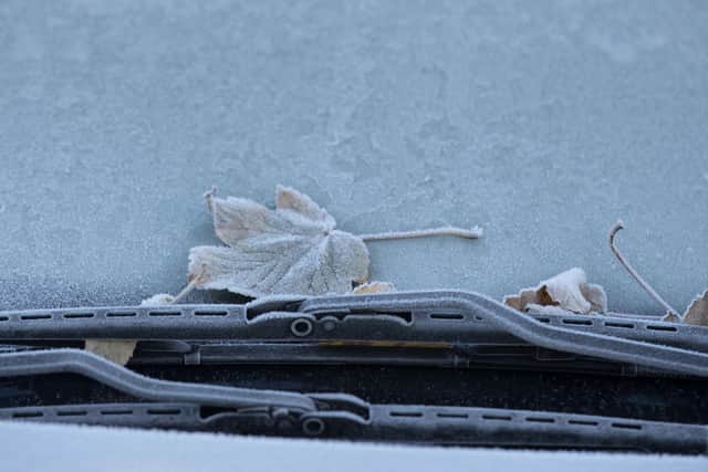 Preparing your car before de-icing it and using the proper equipment can make the job quick and easy. Photo by Matt Cardy/Getty Images.