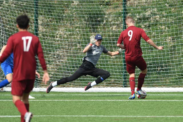 Jack Palmer about to put Burrfields into a 3-2 lead. Picture: Neil Marshall