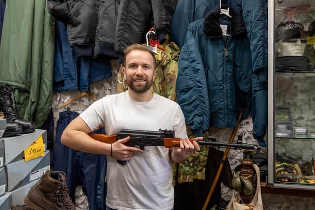 Max Anderson with a replica AK47 now reconditioned for use in Airsoft matches. 

Picture: Mike Cooter