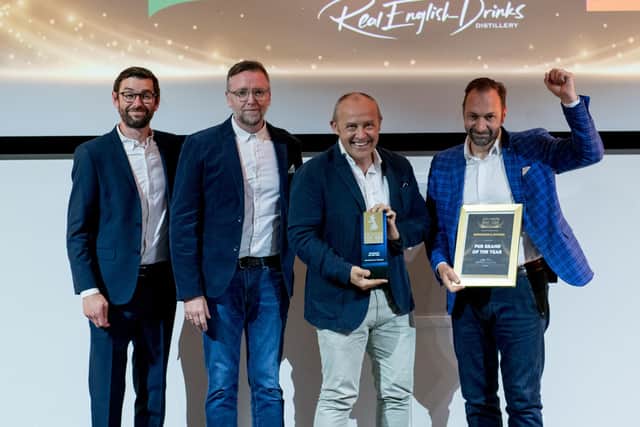 Co-founders Kris Gumbrell and Simon Bunn collecting the award from Tristan O’Hara (Pub and Bar Magazine) and Adrian Devlin (KBE Drinks).