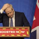 Prime Minister Boris Johnson gestures during a coronavirus media briefing in Downing Street, London, on Jan. 4, 2022. Picture by Jack Hill, Pool Photo via AP