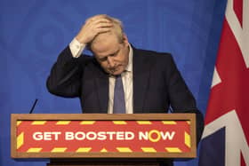 Prime Minister Boris Johnson gestures during a coronavirus media briefing in Downing Street, London, on Jan. 4, 2022. Picture by Jack Hill, Pool Photo via AP