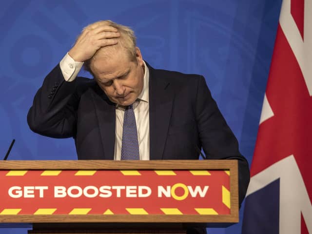 Prime Minister Boris Johnson gestures during a coronavirus media briefing in Downing Street, London, on Jan. 4, 2022. Picture by Jack Hill, Pool Photo via AP