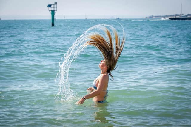 Lucy Wright having cooling her head in the sea. Picture: Habibur Rahman