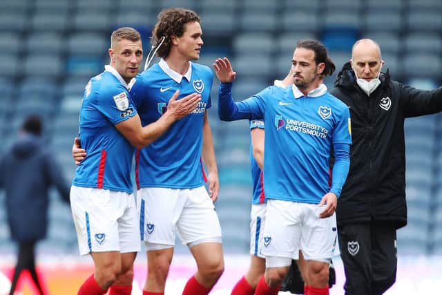 Lee Brown, Rasmus Nicolaisen and Ryan Williams celebrate the win over MK Dons. Picture: Joe Pepler
