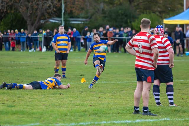 Alex Duncombe with another successful kick for Gosport & Fareham. Picture: Mike Cooter