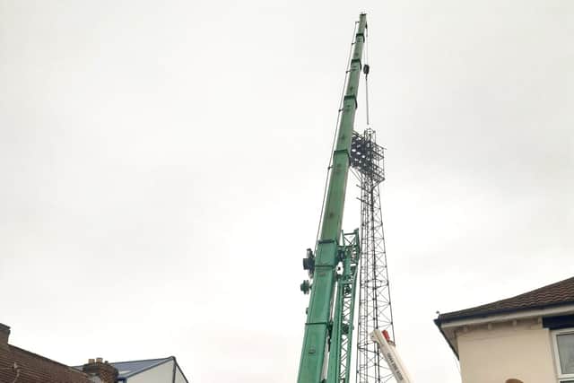 The last floodlight pylon coming down at Fratton Park.  Picture: Steve Hopes