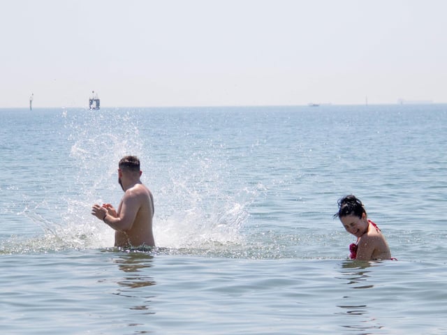 Pictured: People having fun in the sea in Southsea.