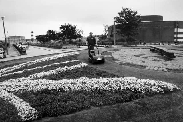 Southsea Castle floral clock gardener Colin Walker keeping the grass under control in July 1995.