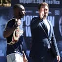 Matchroom Boxing promoter Eddie Hearn, centre, gets his arm in the middle of a fiery face-off between Mikey McKinson, right, and Chris Kongo prior to their meeting last March. Picture: Mark Robinson/Matchroom Boxing