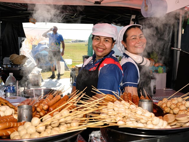 Pictured is: Two of the chefs at Lilly's Thai Kitchen
Picture: Keith Woodland