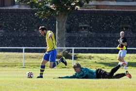 Conor Mansfield rounds the Whiteley keeper to score his second goal. Picture: Chris Moorhouse