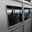 A trainee wearing a VR headset on the bridge wing of the new simulator. Picture: Royal Navy.