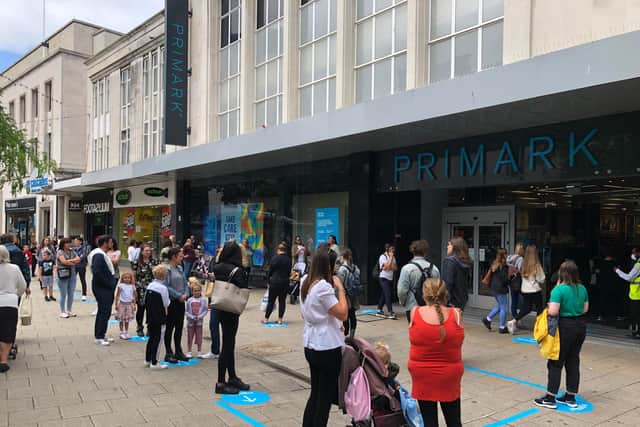 Shoppers queue to get in Primark in Commercial Road, Portsmouth, when it reopened in the summer. Picture: Richard Lemmer