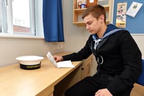 Pictured: Image shows Able Seaman Connor Berry in the en-suite cabins in the junior rates accommodation, Falklands Block at HMS Nelson, HMNB Portsmouth, when it opened in February 2015.
Picture: LA(Phot) Dan Rosenbaum