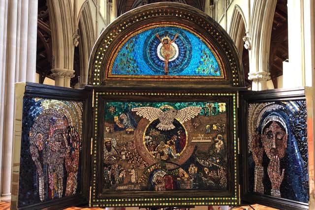 Portsmouth-based artist Pete Codling has created a mosaic depicting the achievements of St Jerome which is being displayed in St John's Catholic Cathedral. Pictured: The Angel Gabriel in the left panel addresses Mary in the right panel; New Testament scenes fill the centre panel