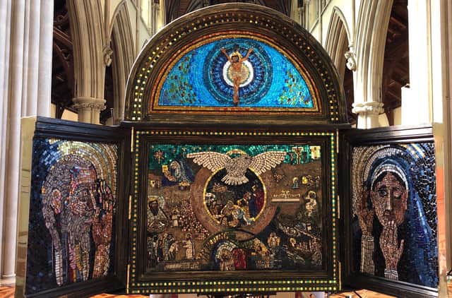 Portsmouth-based artist Pete Codling has created a mosaic depicting the achievements of St Jerome which is being displayed in St John's Catholic Cathedral. Pictured: The Angel Gabriel in the left panel addresses Mary in the right panel; New Testament scenes fill the centre panel