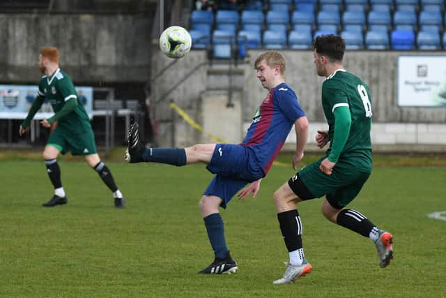 Vinnie McGee in action for US Portsmouth against Brockenhurst. Picture: Neil Marshal