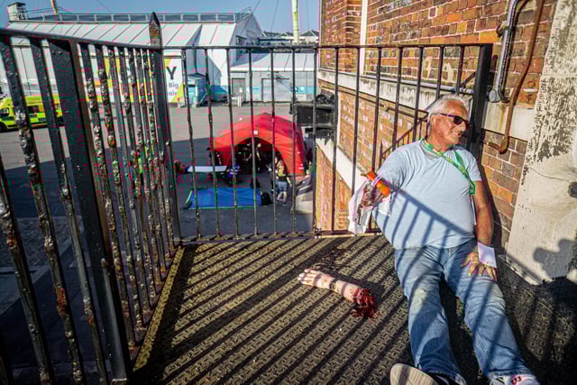 Emergency services exercise at Historic Dockyard, Portsmouth on Thursday 19th June 2025 Pictured: Actors at aftermath of improvised explosion in dockyard building Picture: Habibur Rahman