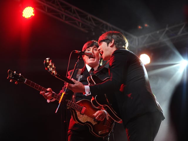 The Bootleg Beatles entertained crowds at the Wickham Festival. Picture: Sarah Standing (310725-1306)