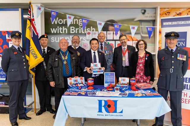 Alan Mak MP (centre) at the Poppy Appeal launch with Havant area Poppy Appeal Lead Andy Carter MBE (fourth right) and RBL Havant Branch President Chris Atkinson (third left)