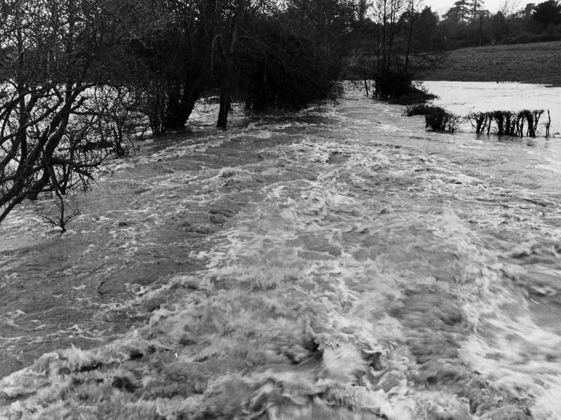 The stream at Southwick turned into a raging torrent by torrential rain in November 1976.