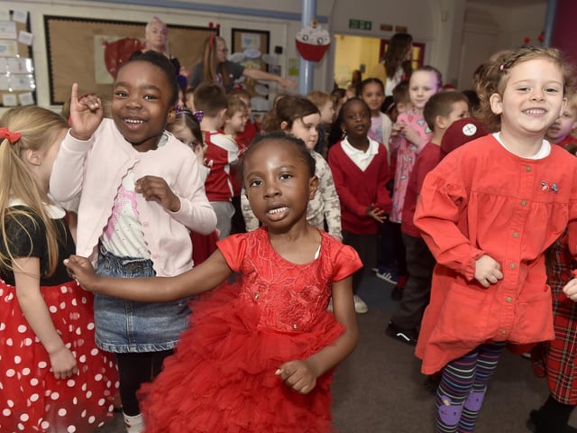 Stamshaw Infant Academy in North End Avenue, Portsmouth, held a Danceathon for Comic Relief on Friday, March 21, 2025. Pictured is: (l-r) Oluwashindara Adeoye, Zoe, Olukayode and Eveline Nemeth.Picture: Sarah Standing (210325-725)