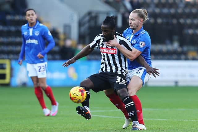 Notts County's Stanley Aborah, seen here tussling with Adam McGurk, caught Paul Cook's eye against Pompey in October 2015. Picture: Joe Pepler