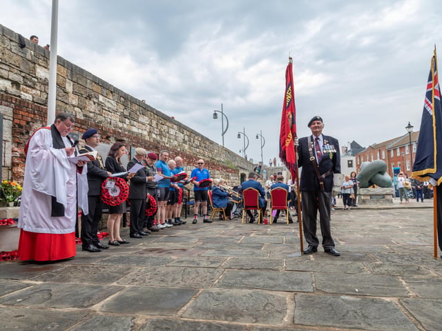 Father Bob White, vicar of St Mary's Church in Fratton, leading the Falklands Memorial Service at Old Portsmouth.